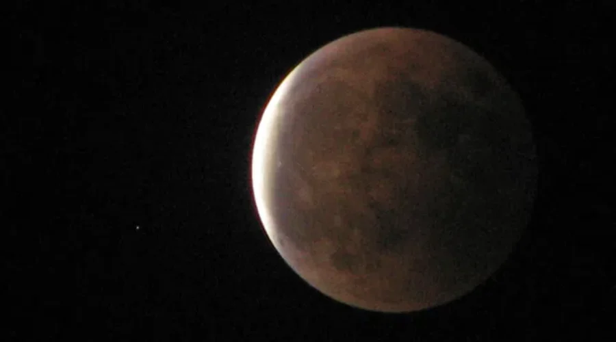 Triple Treat In The Skies Tonight – Snow Moon, Lunar Eclipse, and Comet