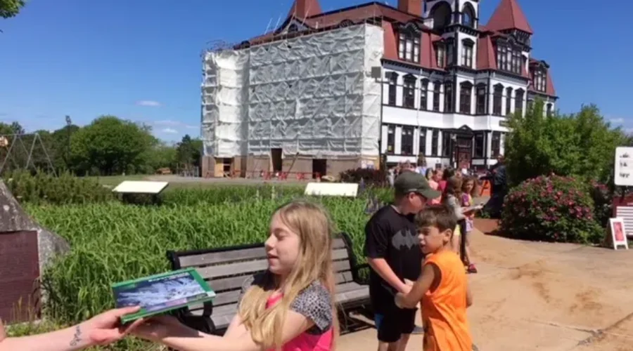 Human Chain Transports Books To New Lunenburg Library
