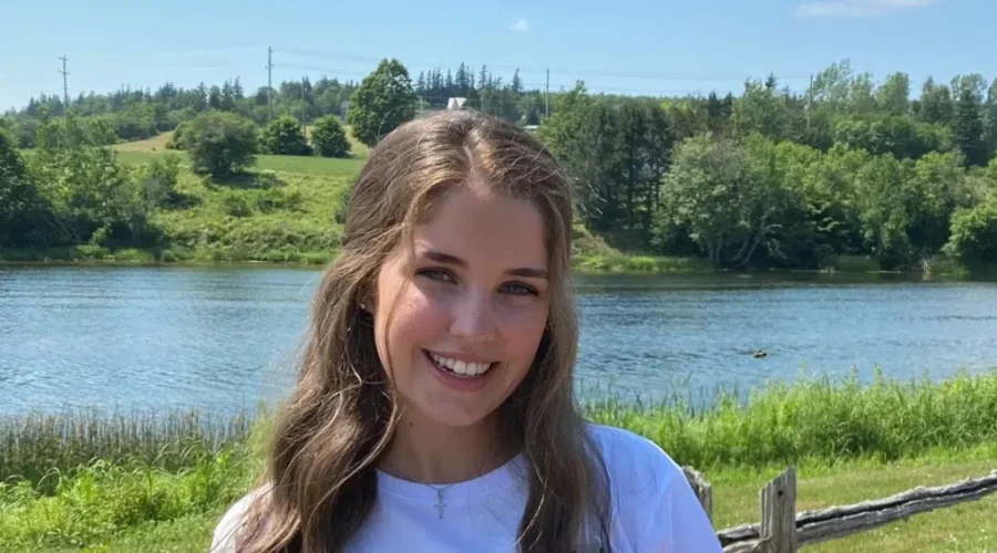 University Student Helping Adults With Special Needs