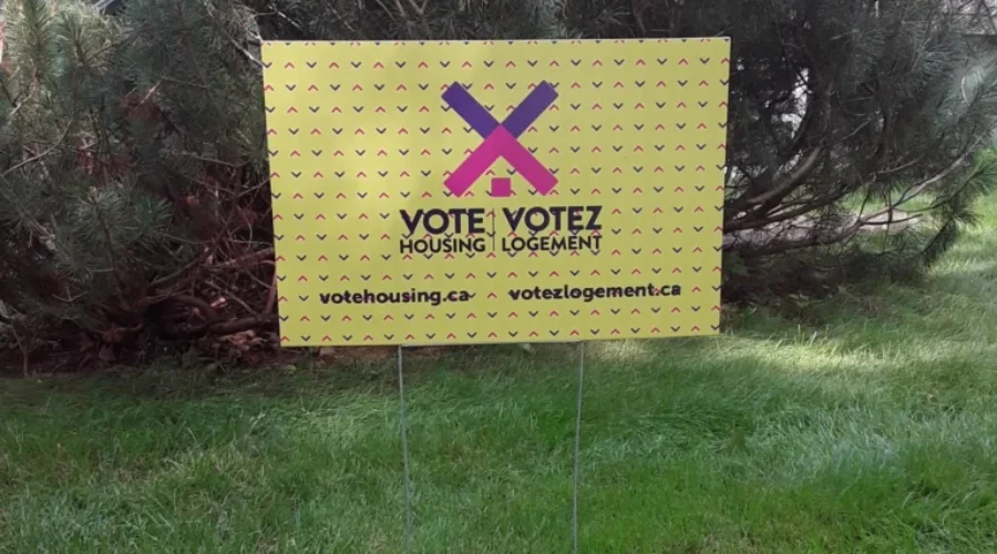 “Vote Housing” Signs Aim to Raise Awareness For Housing Crisis