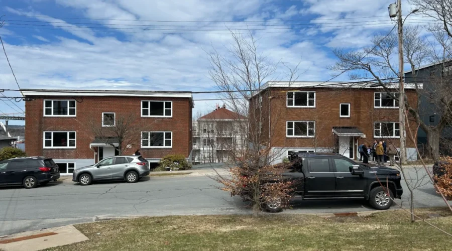 Non-profits open low-cost apartments for youth, young adults