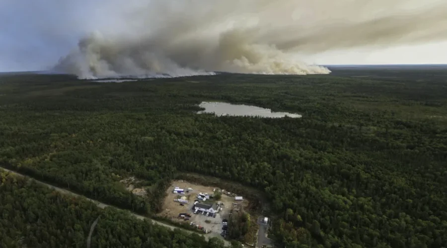 Long Lake wildfire still out of control as crews brace for possible Monday rain