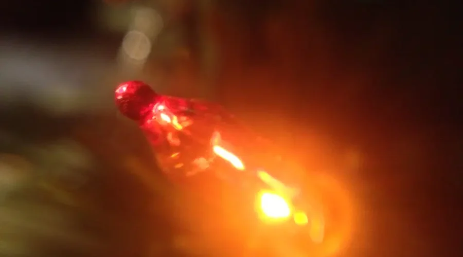 That Is NOT A Free Replacement! The Reason For The Red Tipped Bulb.